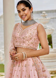 Pink silk lehenga choli with heavy sequin embroidery and organza dupatta