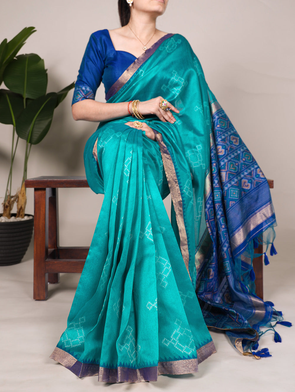 Teal Jacquard silk saree with zari weaving