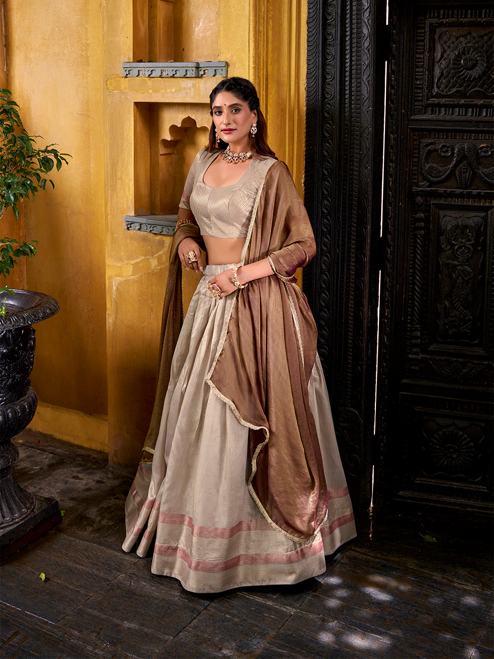 Cream dupion silk lehenga choli with zari border