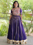 Purple mirror work lehenga choli with Gamthi embroidery for Navratri Garba