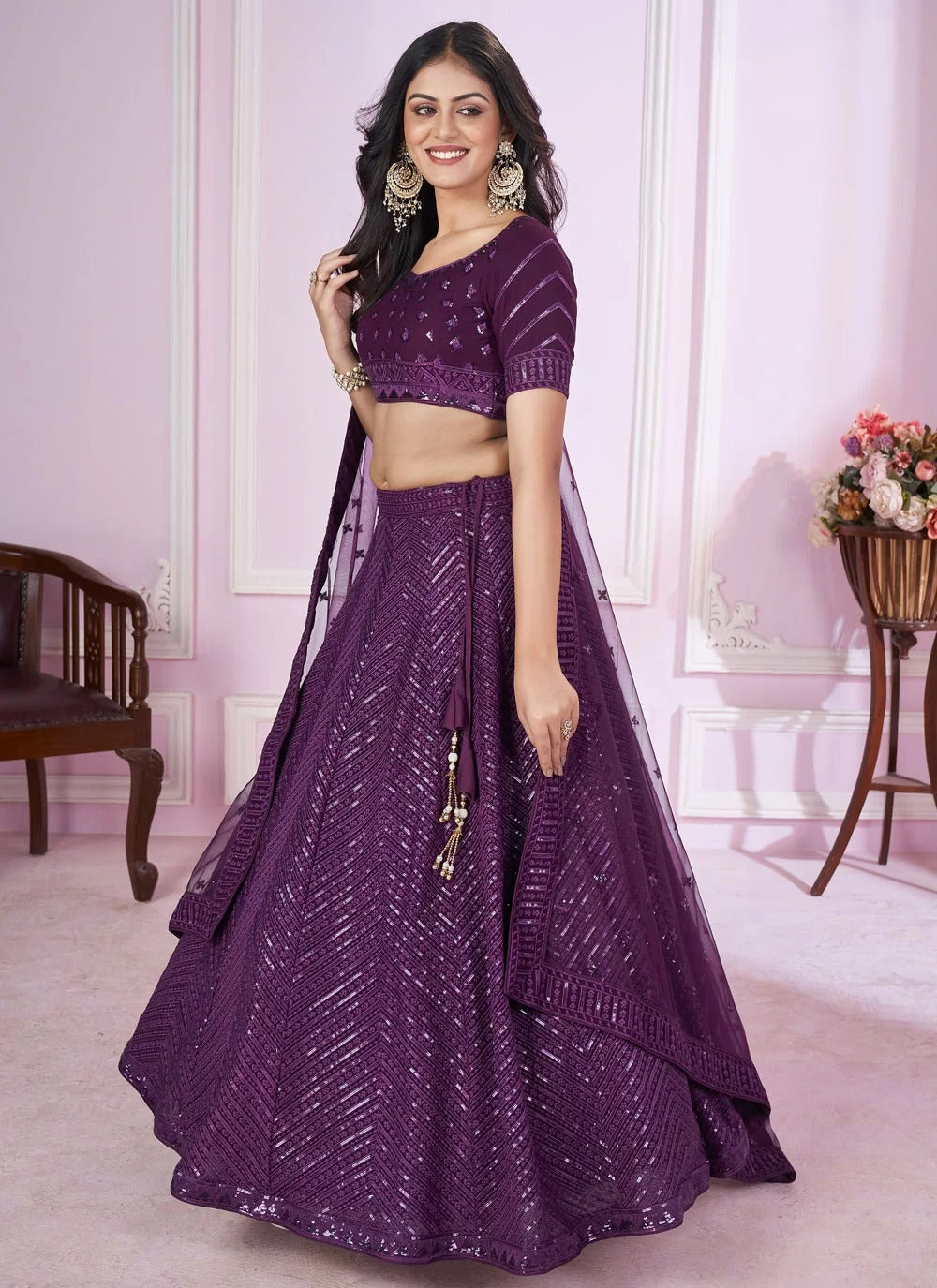 Sequins embroidered purple lehenga with net dupatta