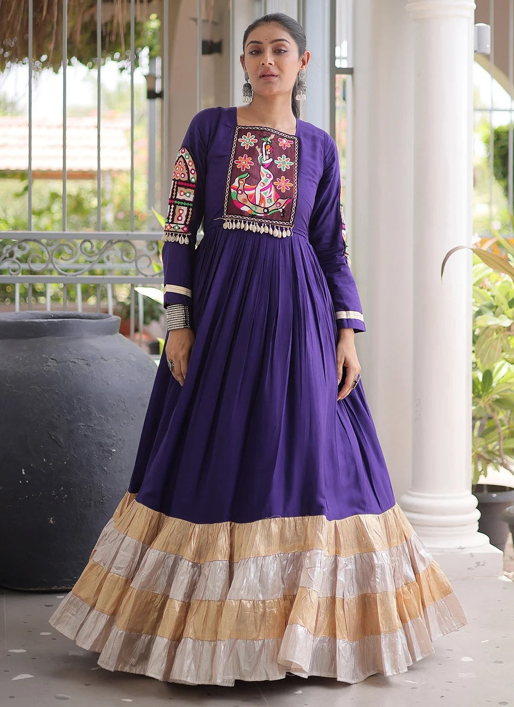 Purple Navratri gown with Kutchi Gamthi thread work and 12 metre flair