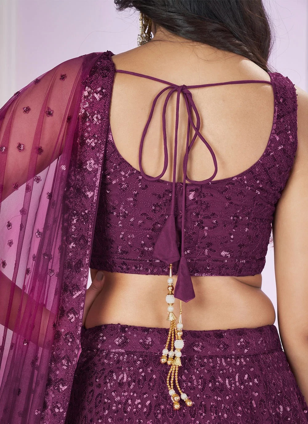 Lightweight purple festive lehenga for wedding celebrations