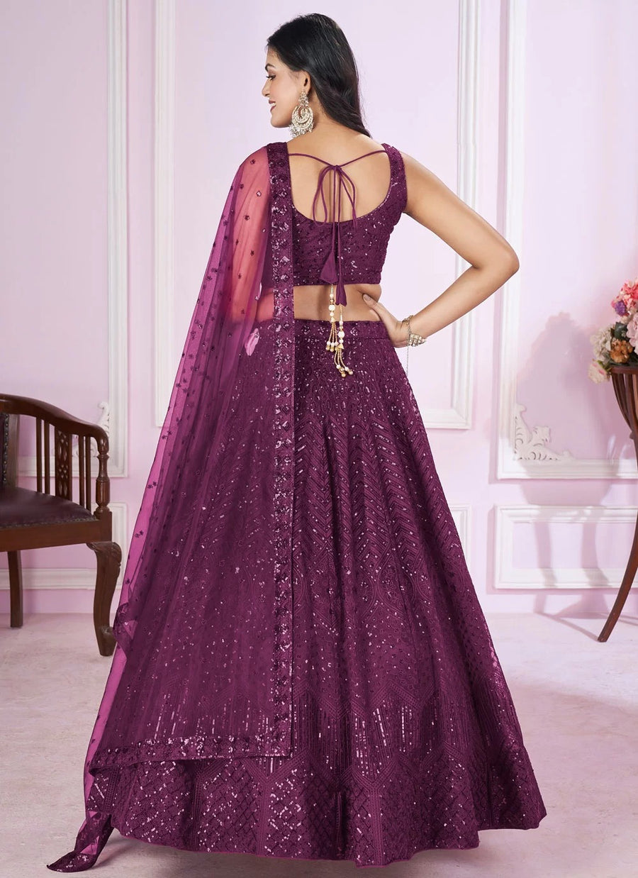 Purple soft net engagement lehenga with sequins embroidery