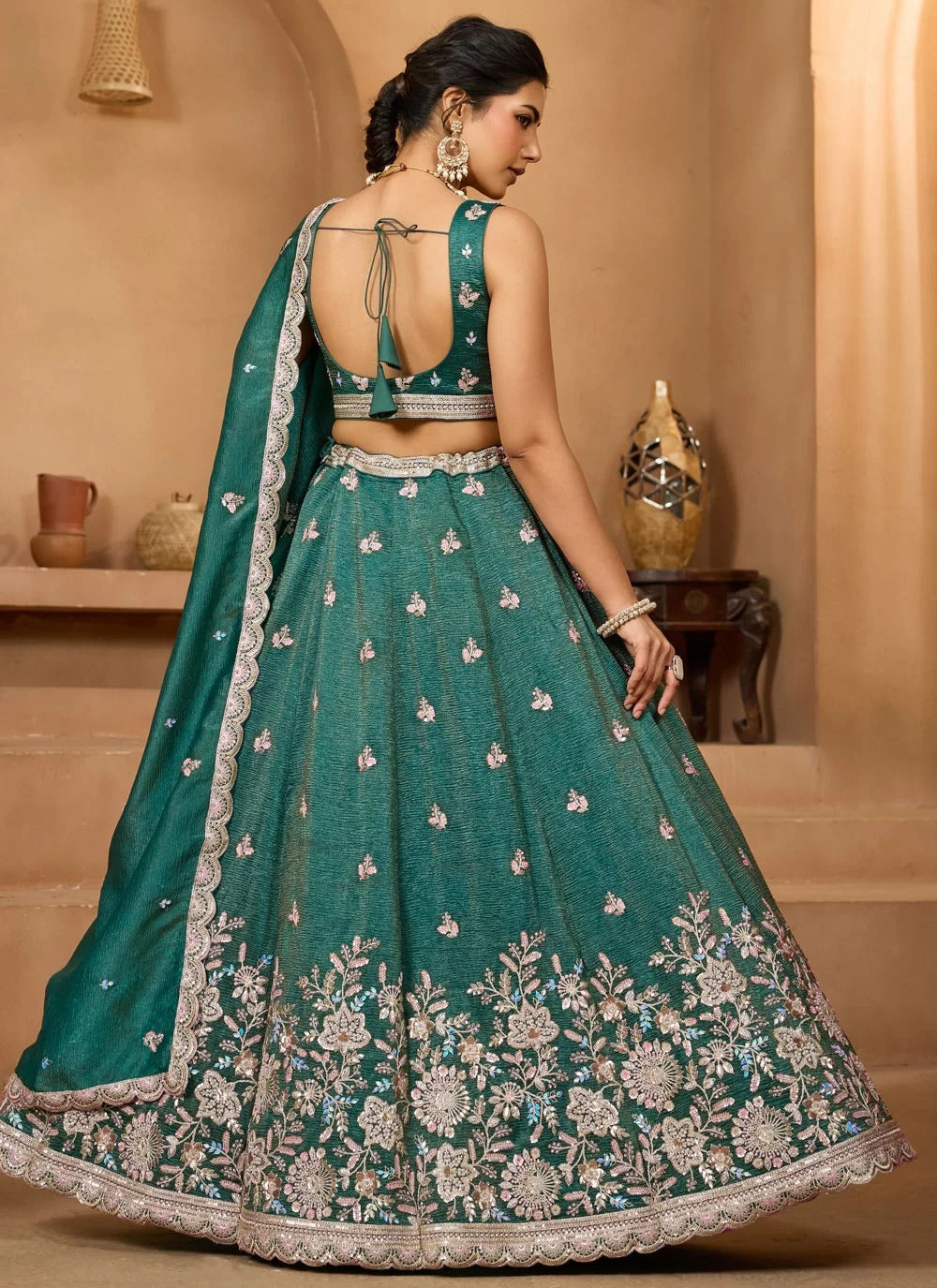 Green tissue lehenga with heavy embroidery work