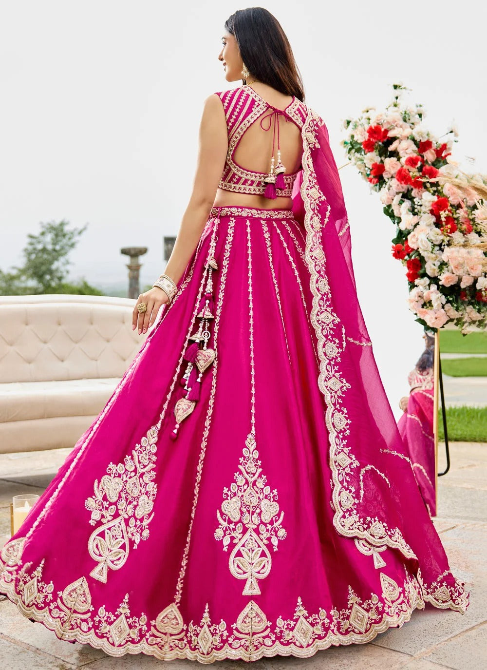 Designer Rani Pink silk lehenga set featuring an embroidered blouse and matching silk dupatta