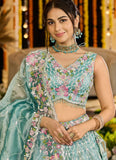 Woman wearing a traditional embroidered outfit with a floral design.