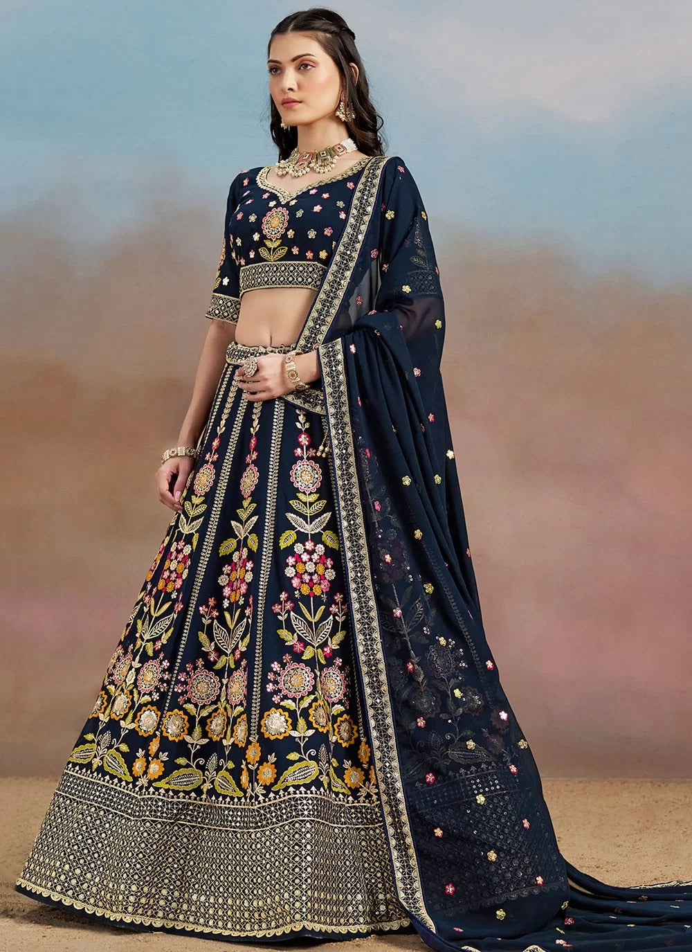 Blue georgette wedding wear lehenga with sequins, zari, dori and multicolor thread embroidery work