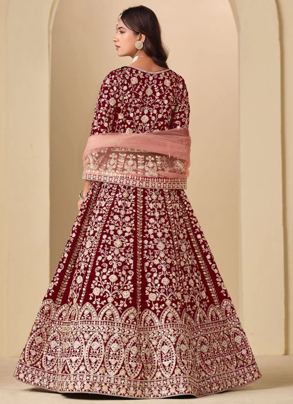 velvet suit designs pakistani in maroon with heavy embroidery