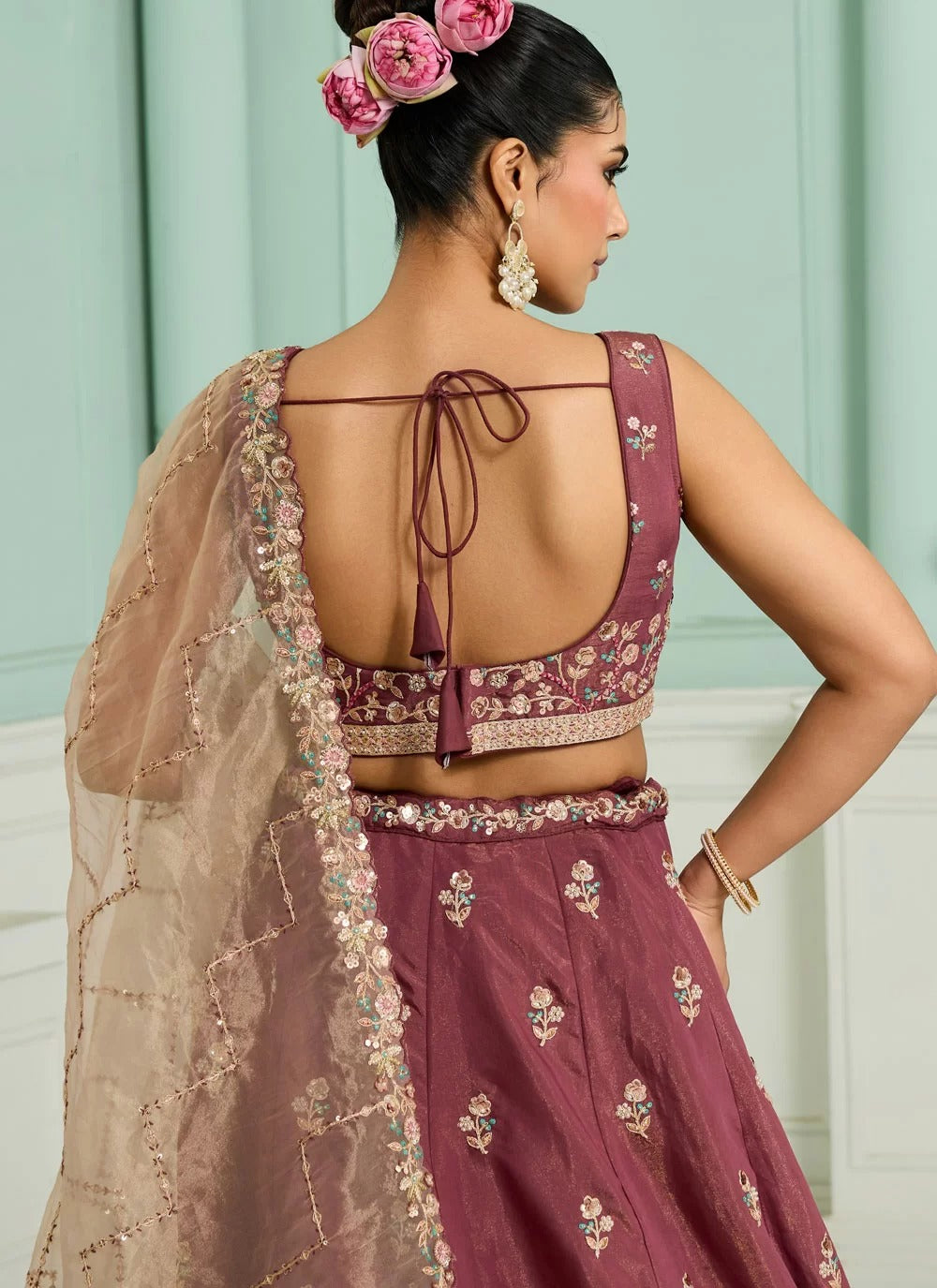Rosegold georgette lehenga choli with heavy sequins, stone work and organza dupatta