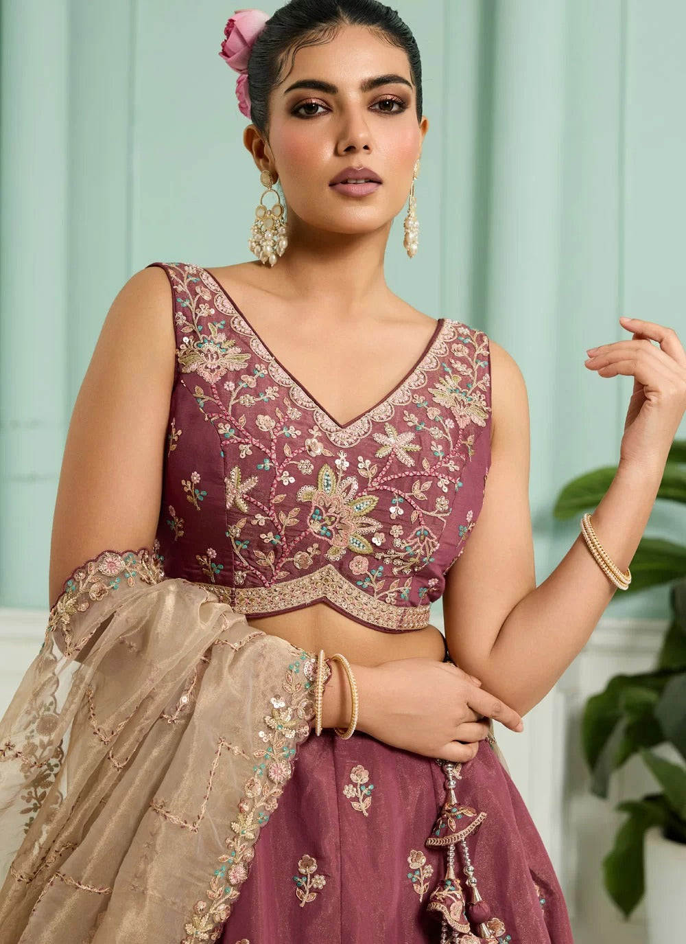 Rosegold georgette lehenga choli with heavy sequins, stone work and organza dupatta