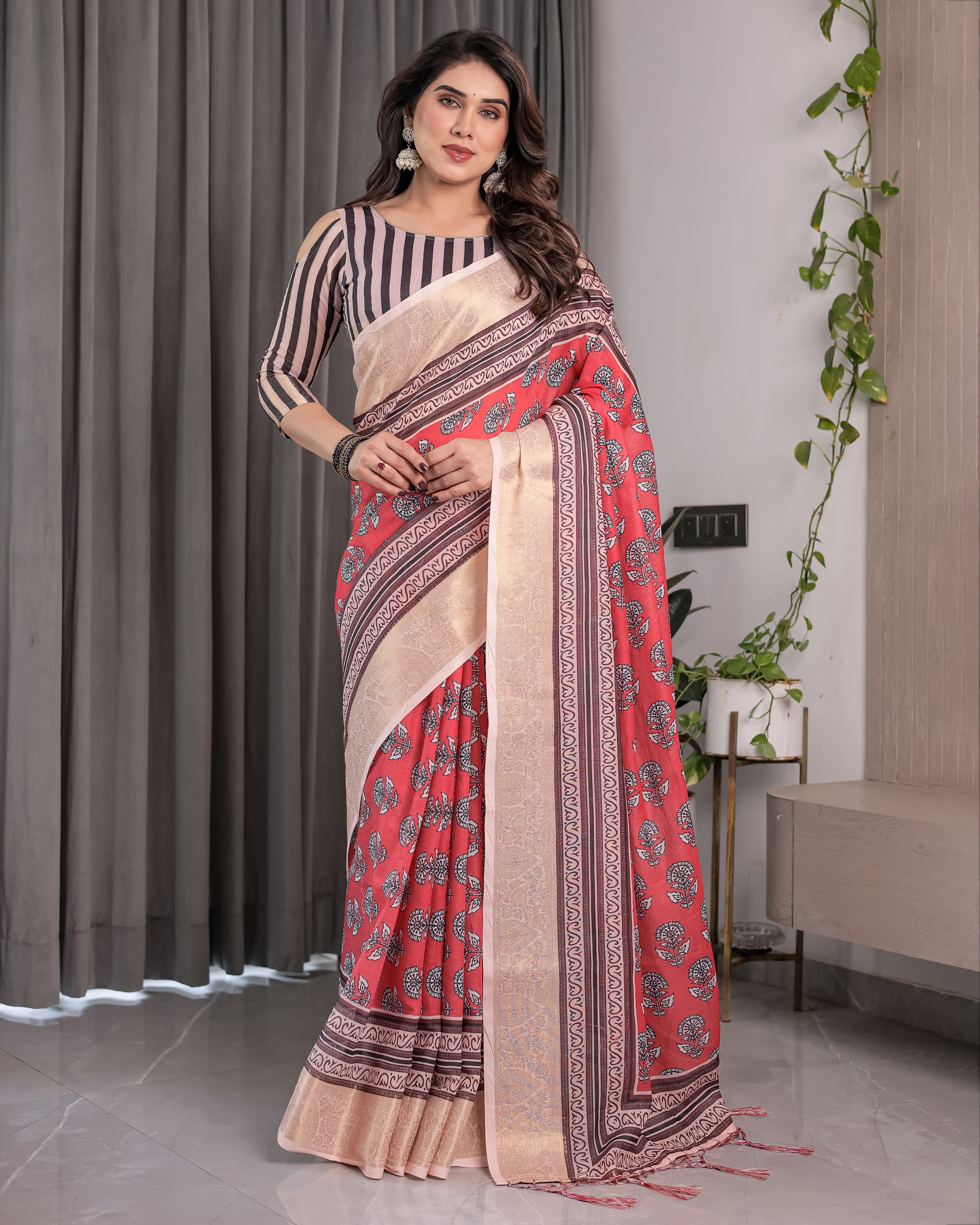 Rust red handloom cotton linen saree with black floral buti motifs