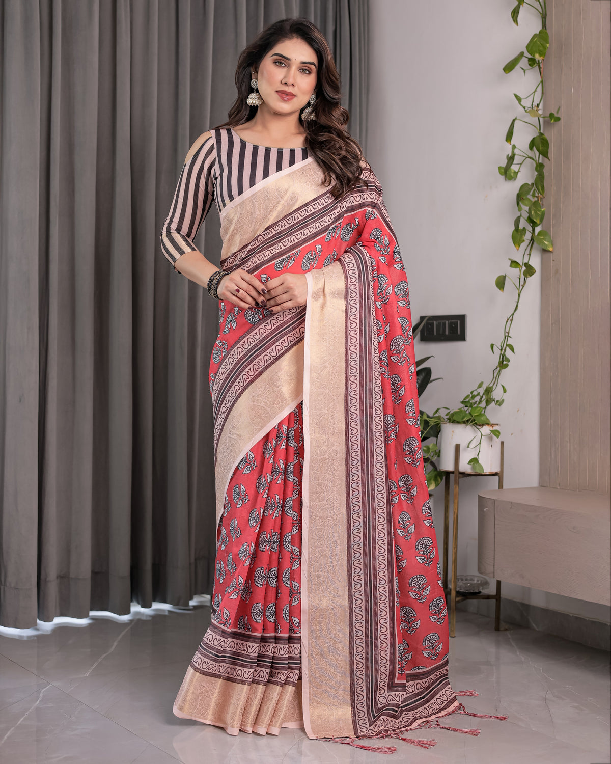 Rust red handloom cotton linen saree with black floral buti motifs