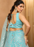 Flowy sea green net lehenga with elegant silhouette