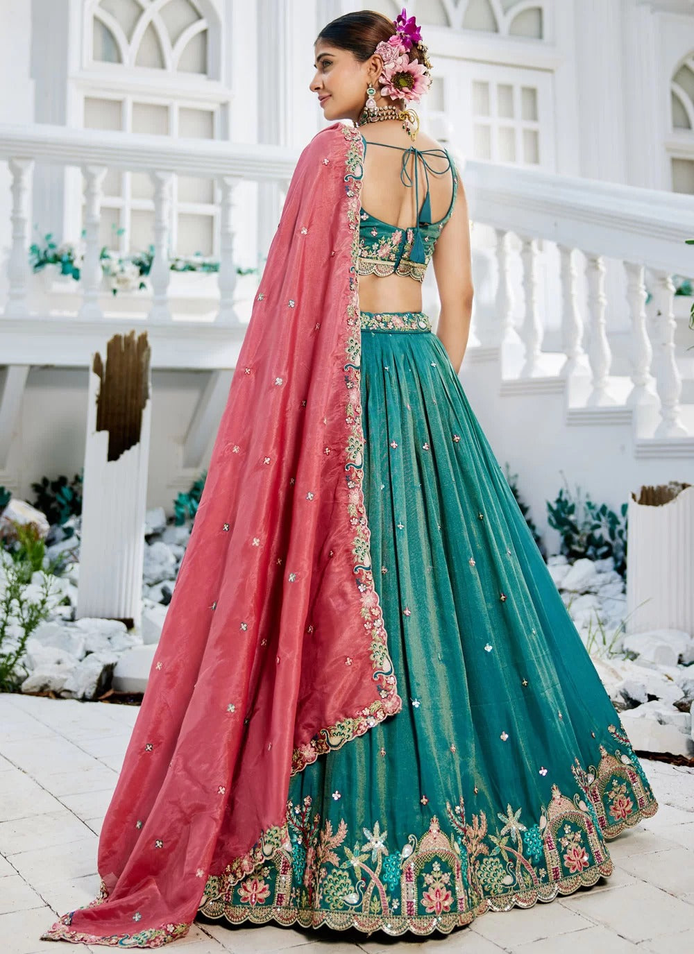 Sea Green Satin Lehenga with Sequins and Embroidery Work paired with contrasting Pink Satin Dupatta
