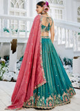Sea Green Satin Lehenga with Sequins and Embroidery Work paired with contrasting Pink Satin Dupatta
