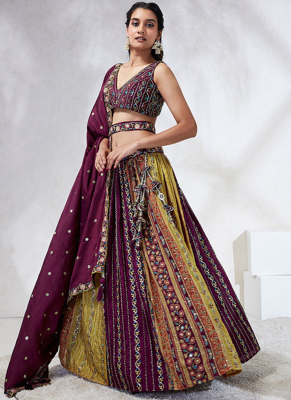 Sequence Patterned Embroidered Silk Wedding Wear Lehenga In Burgundy