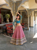 Peach Color Sequins And Thread Embroidery Work Moonga Silk Lehenga Choli