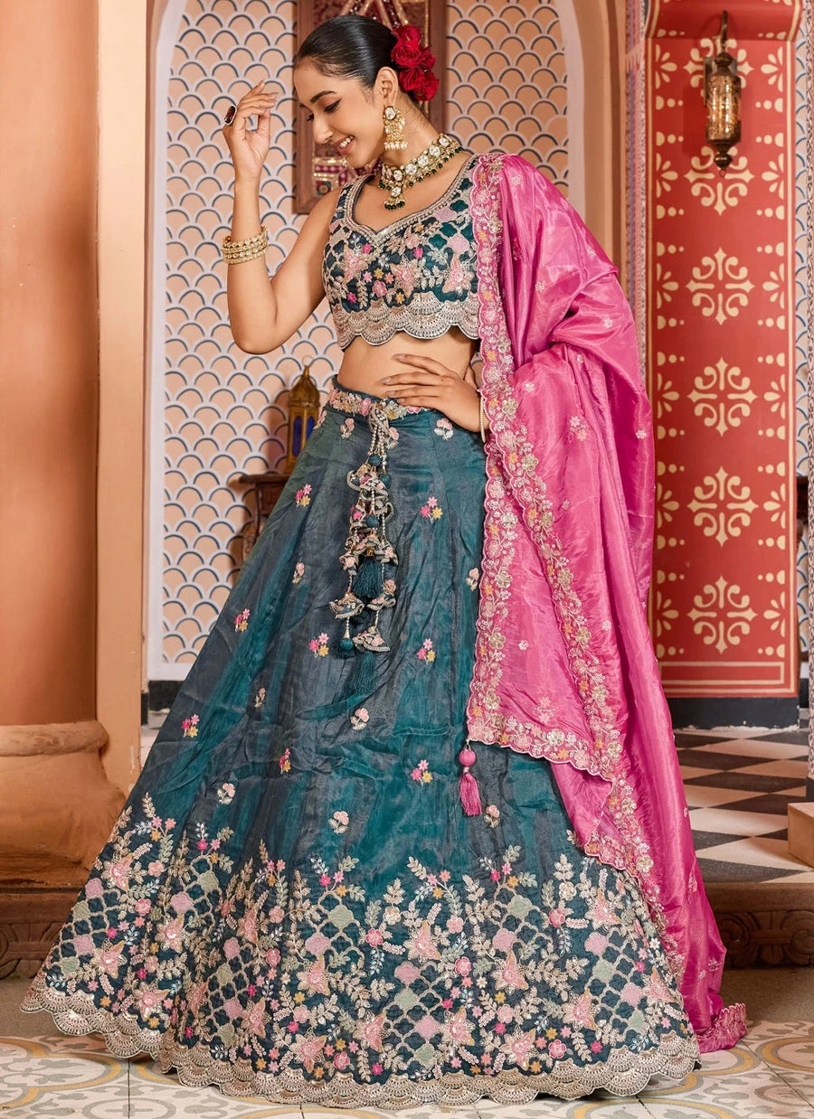 Teal tissue bridesmaid lehenga with sequins embroidery