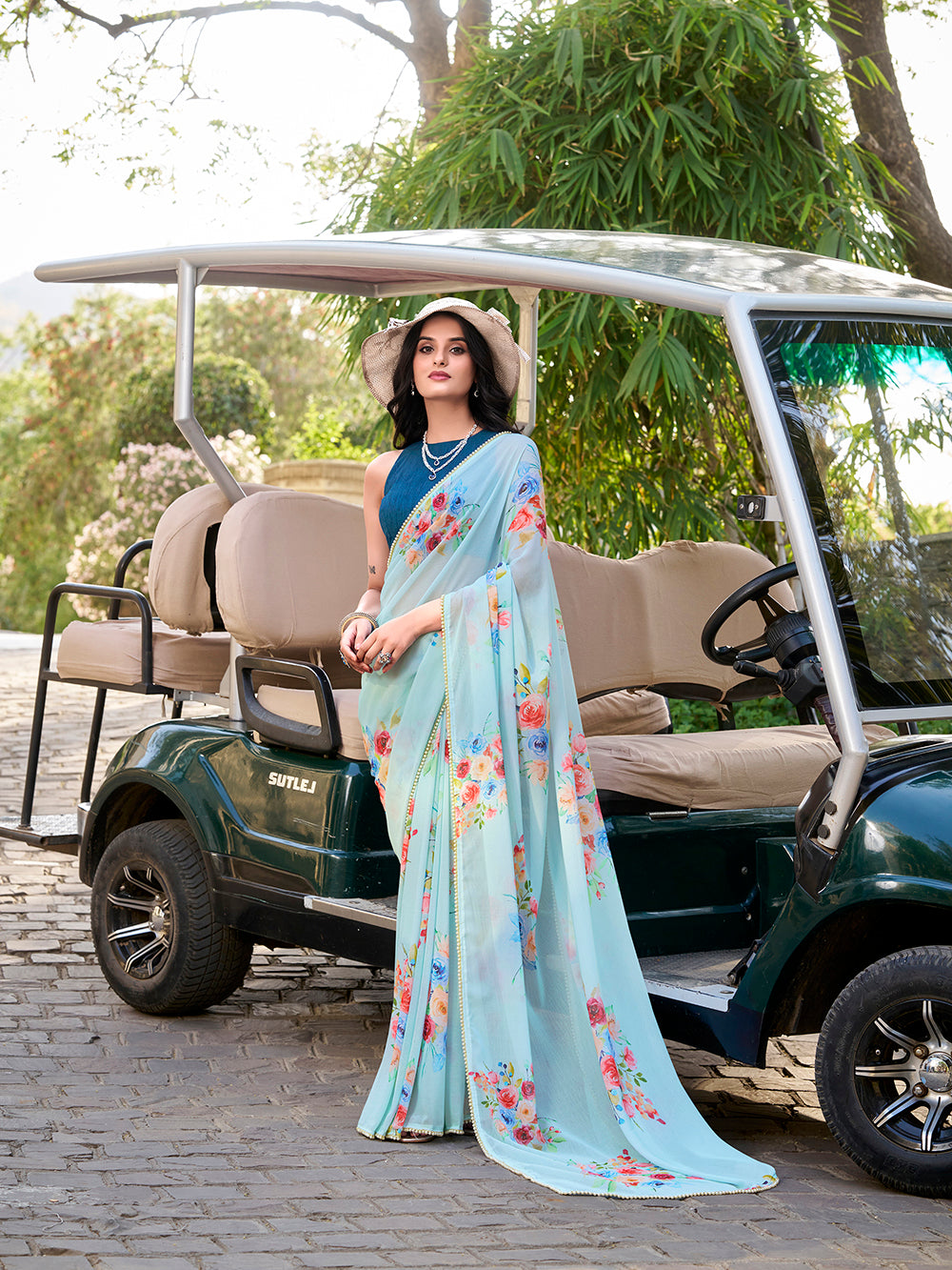 Sky blue marbal saree with floral print