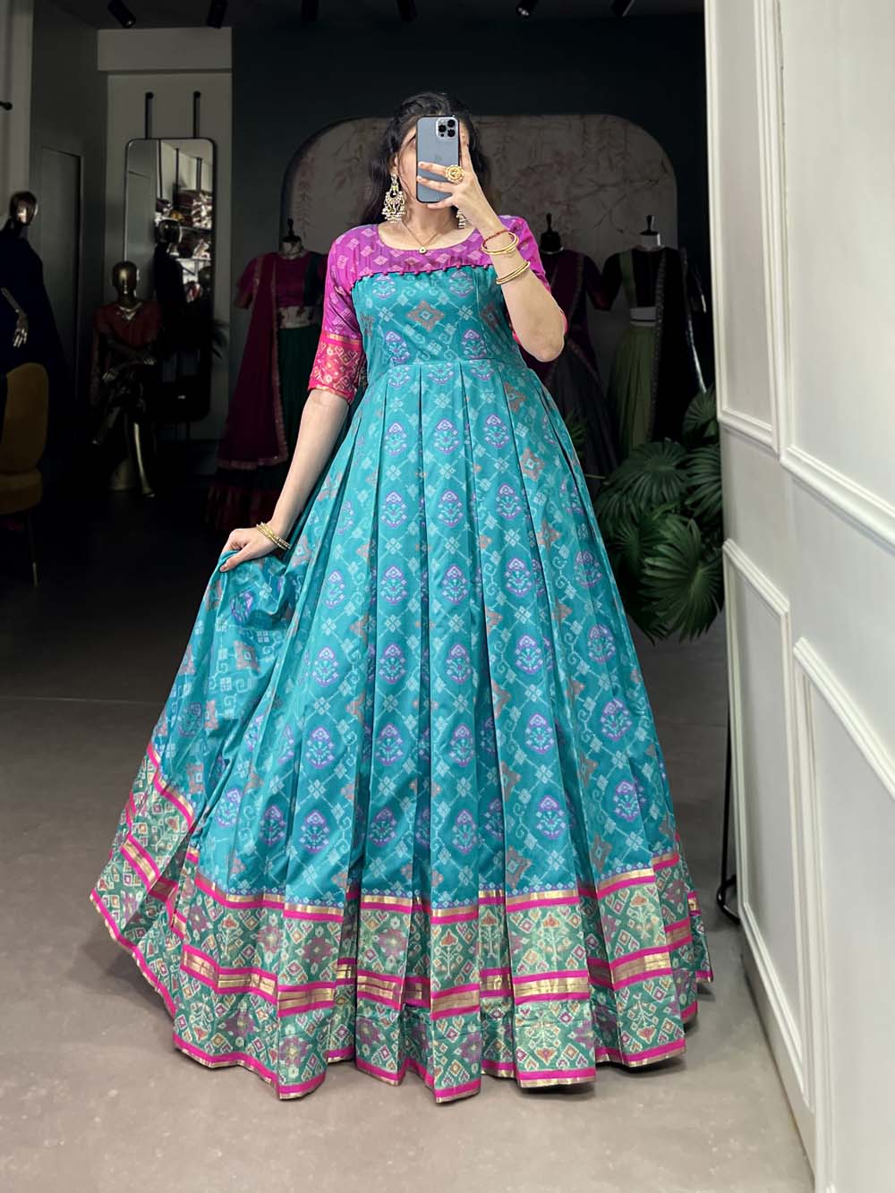 Sky Blue Color Jacquard Silk Patola Print With Zari Weaving Work Gown