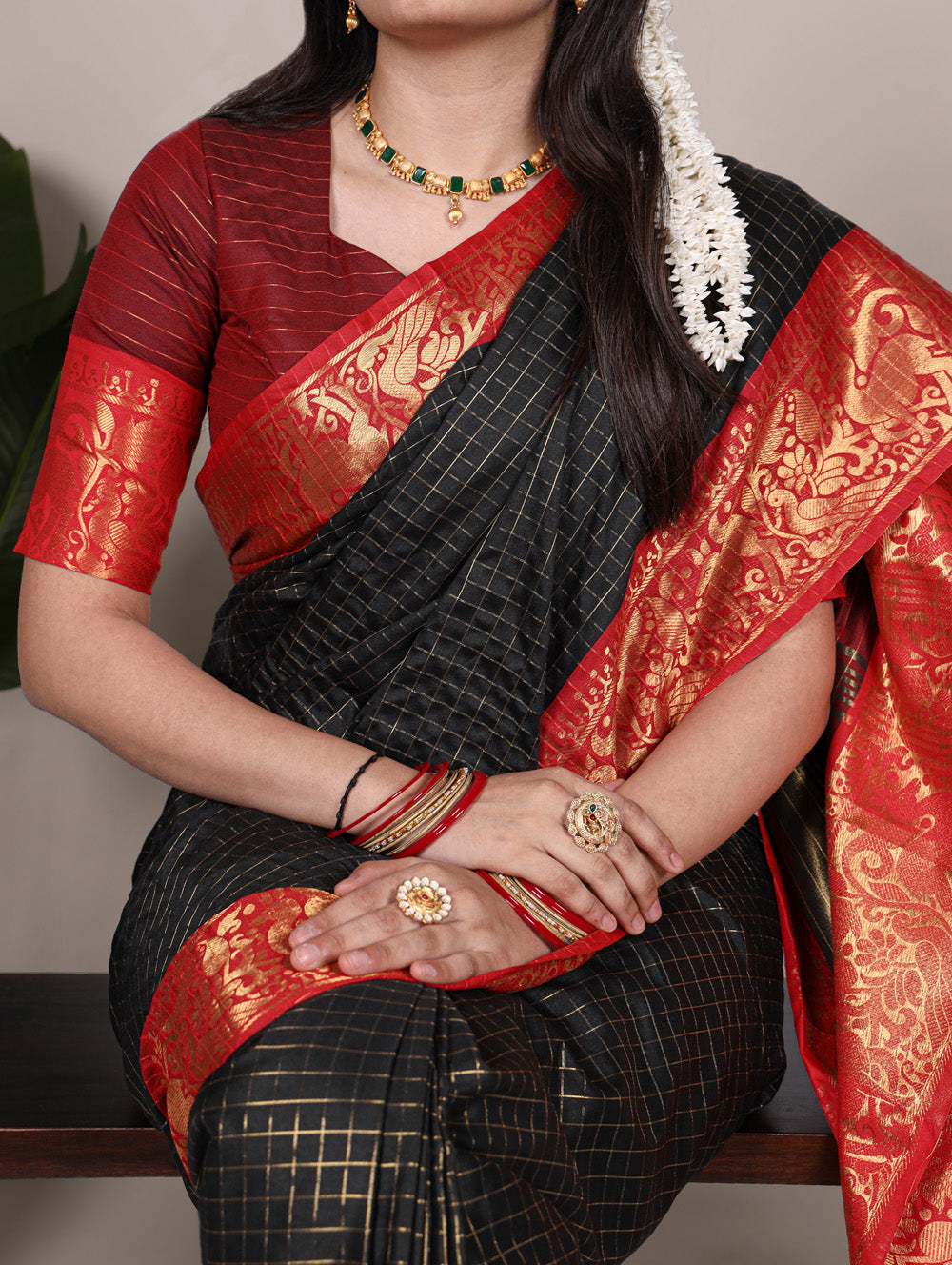 Black poly cotton chex saree with zari weaving