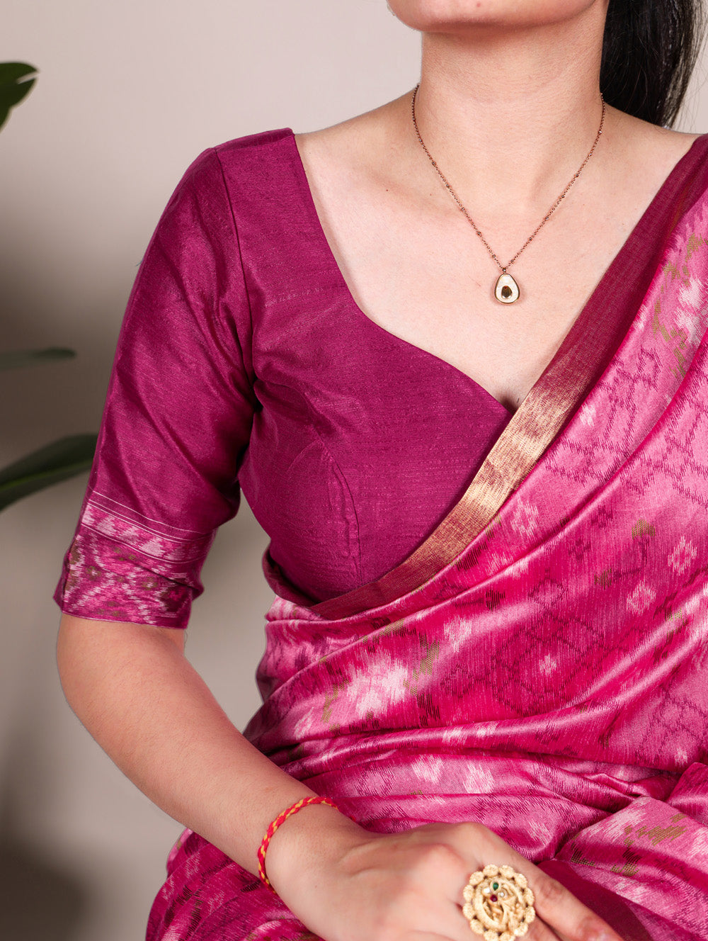 Pink silk saree with traditional patola motifs
