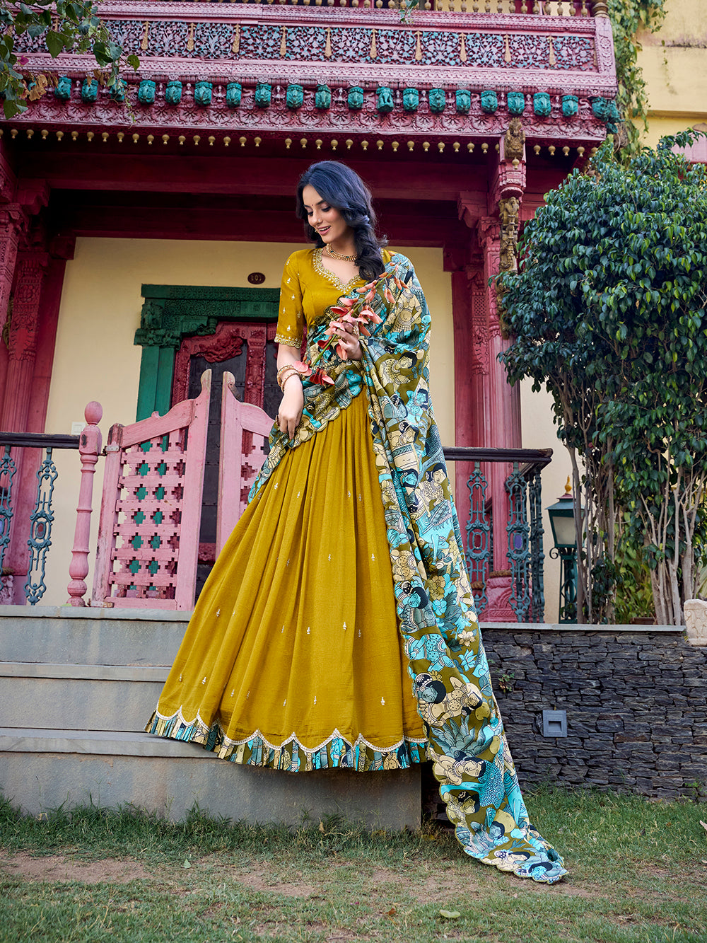 Mustard Vichitra silk lehenga with Kalamkari border