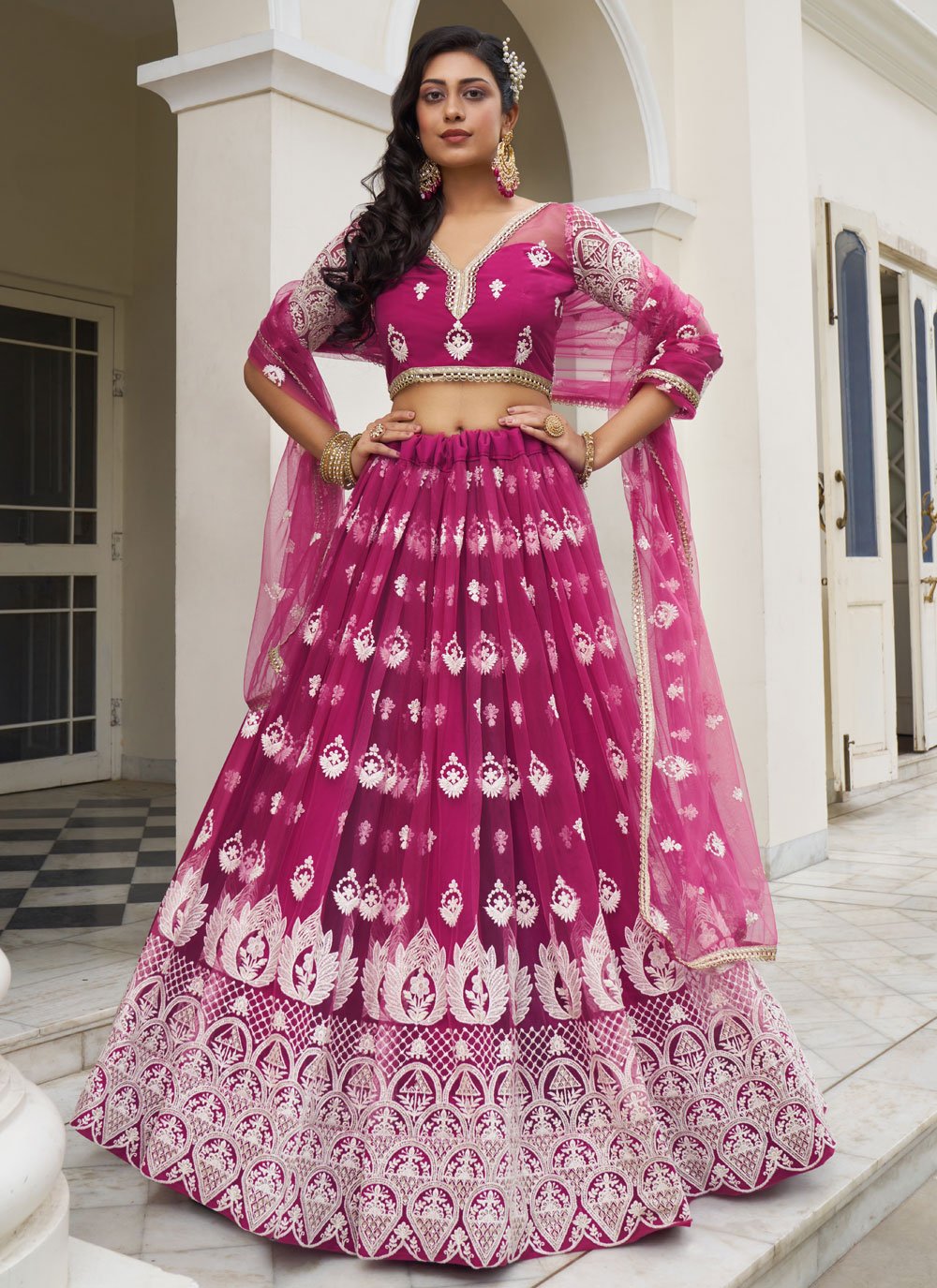 Stunning Dark Pink Butterfly Net Embroidered Party Wear Lehenga Set