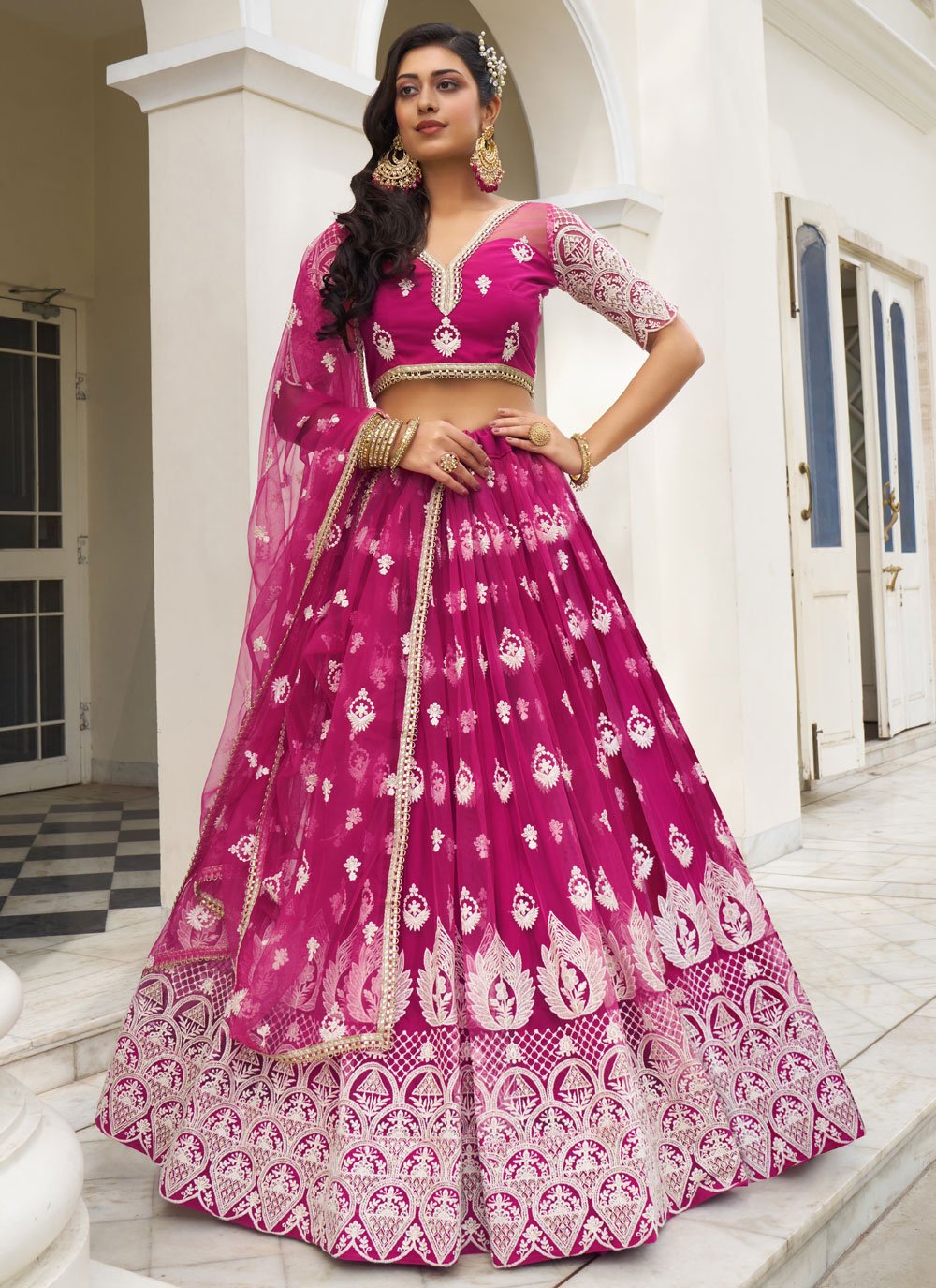 Stunning Dark Pink Butterfly Net Embroidered Party Wear Lehenga Set