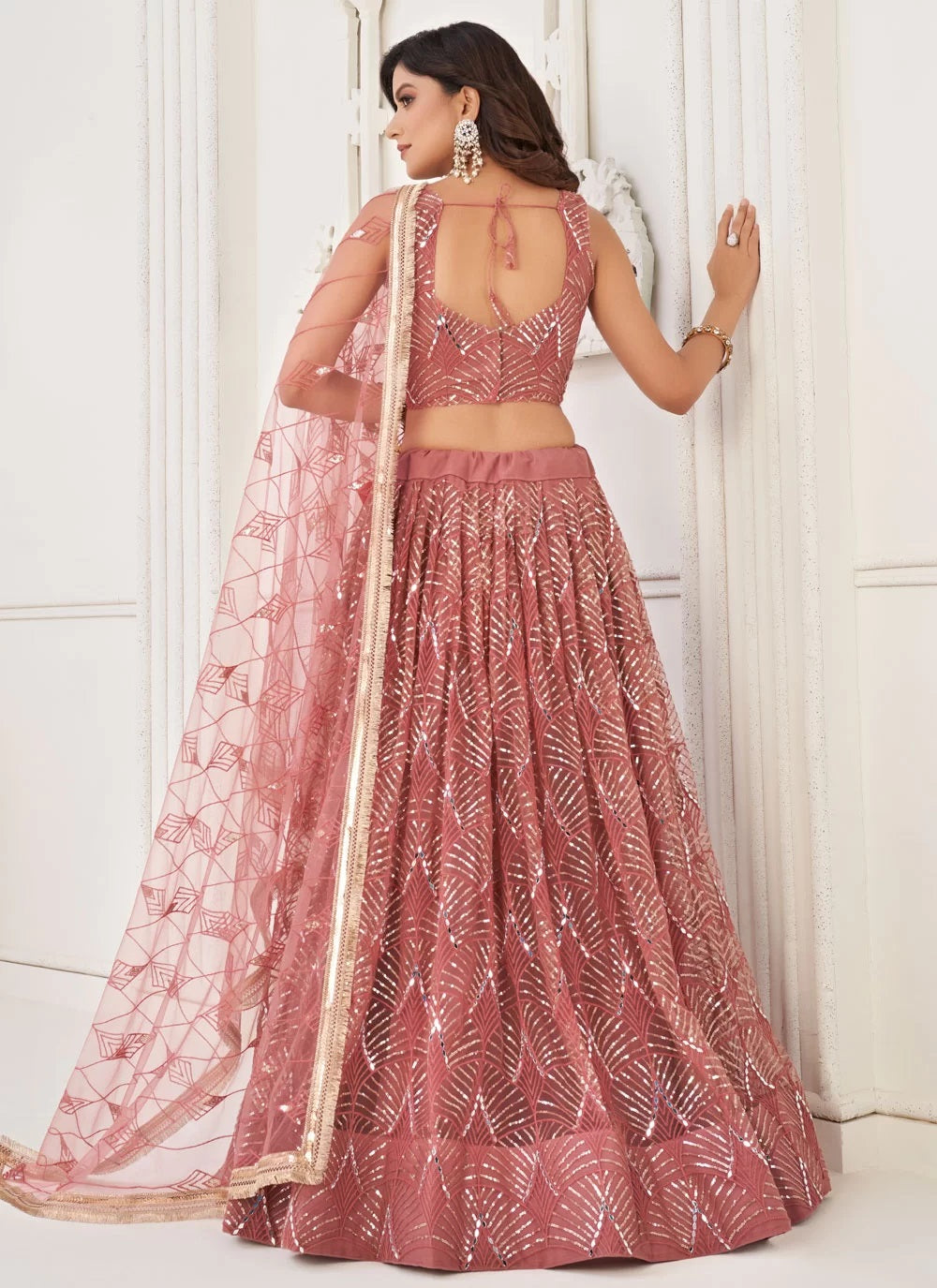 Stunning Dusty Pink Sequins Net Wedding Wear Lehenga With Dupatta