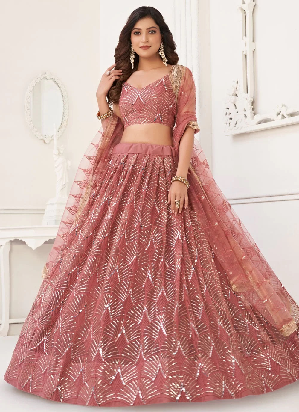 Stunning Dusty Pink Sequins Net Wedding Wear Lehenga With Dupatta