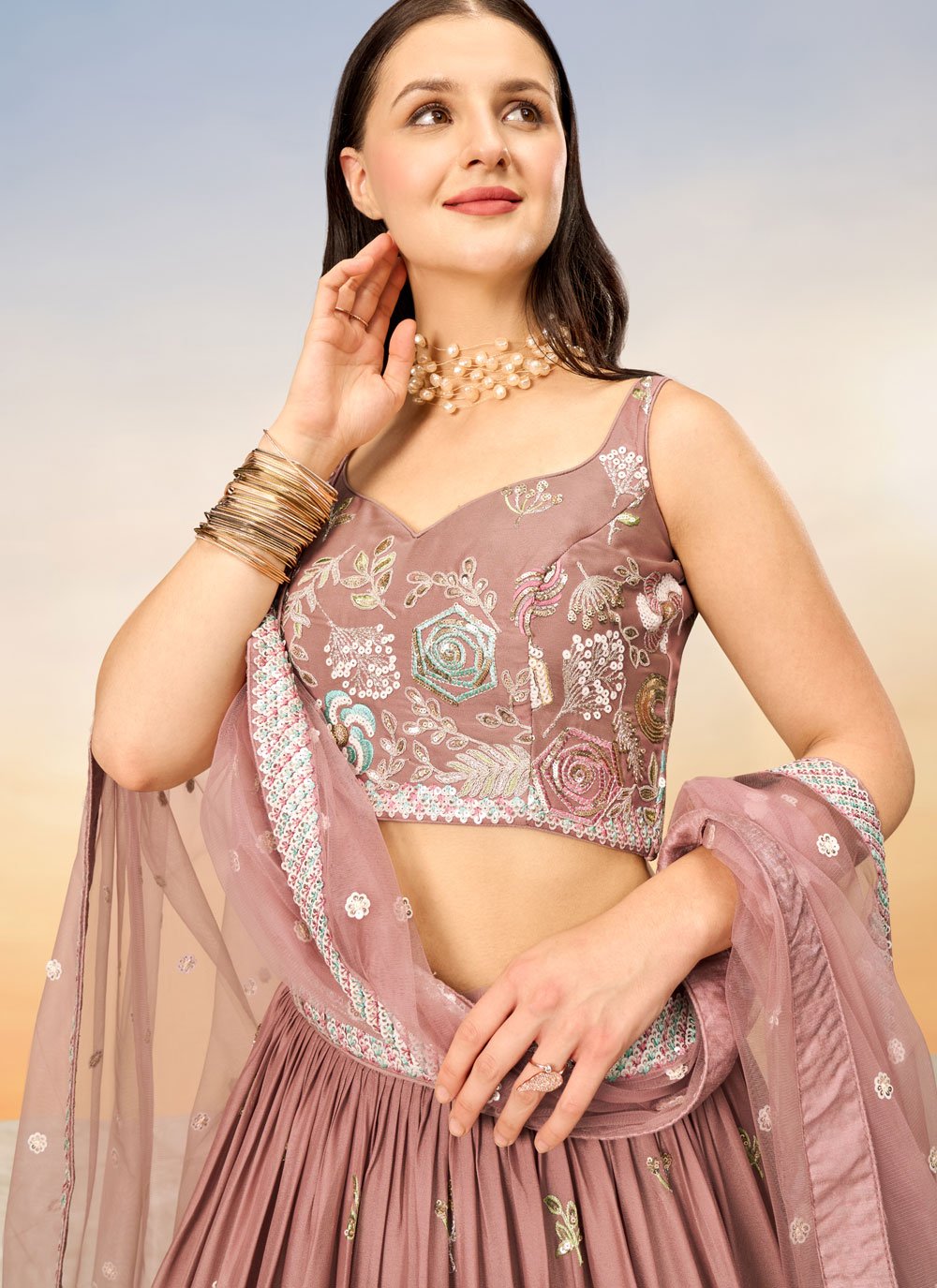 Stunning Rose Gold Bridesmaid Lehenga Choli with Intricate Sequins Work