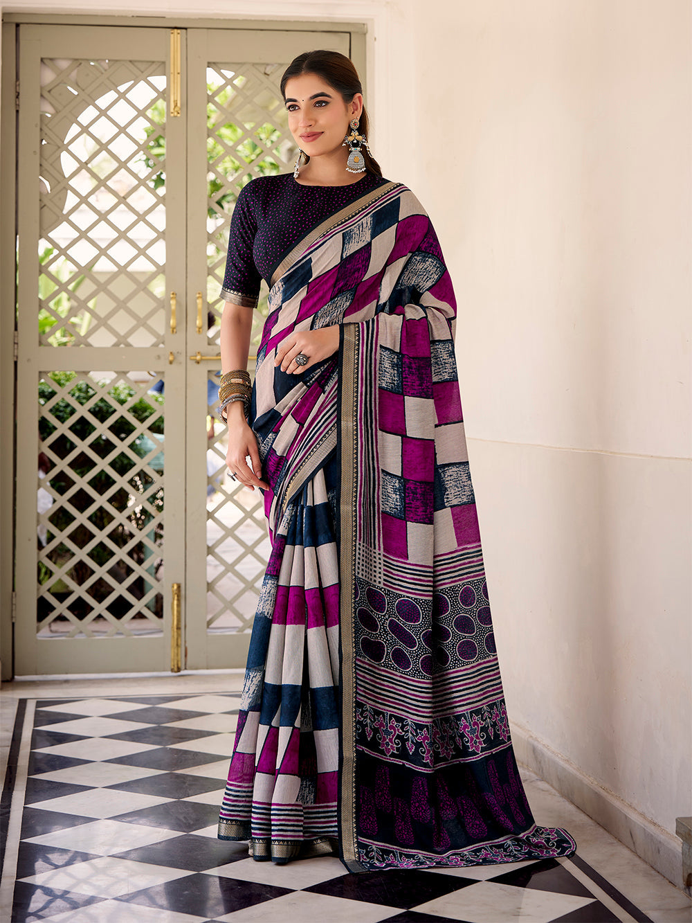Navy blue chanderi saree with temple lace border