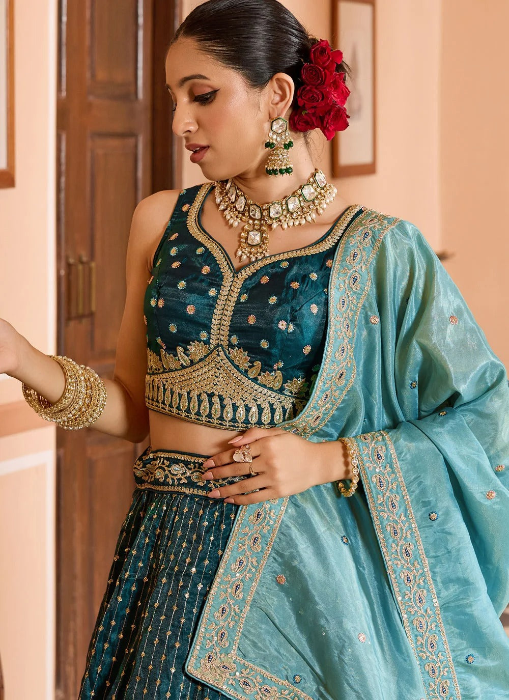 Sequins embroidered teal tissue silk lehenga