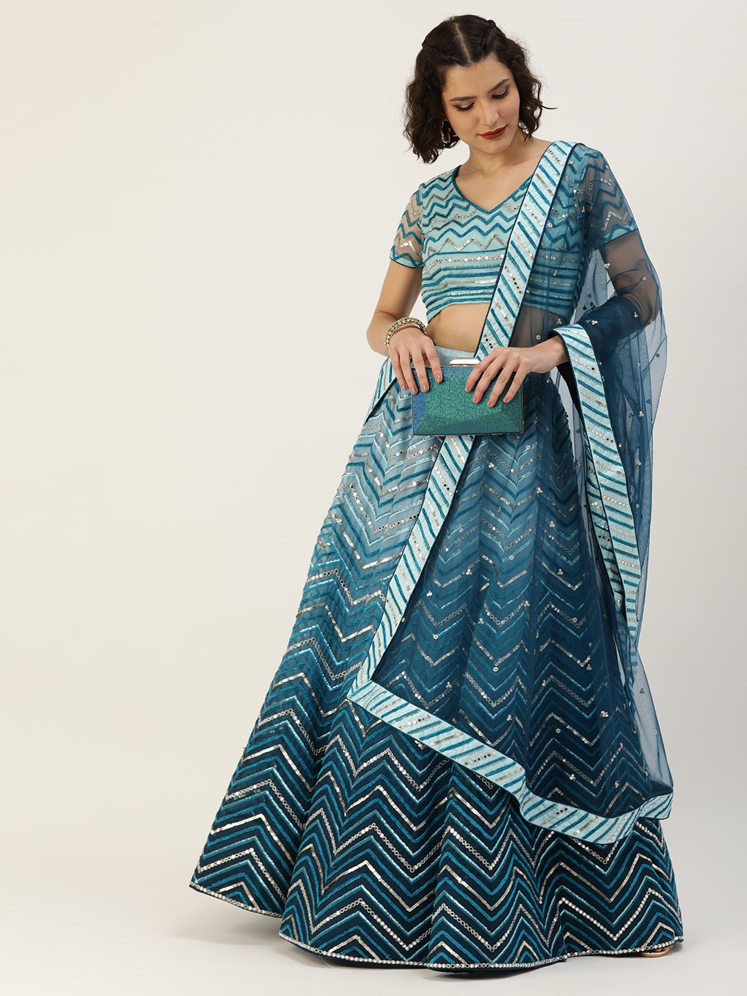 Teal Embroidered Lehenga in Net