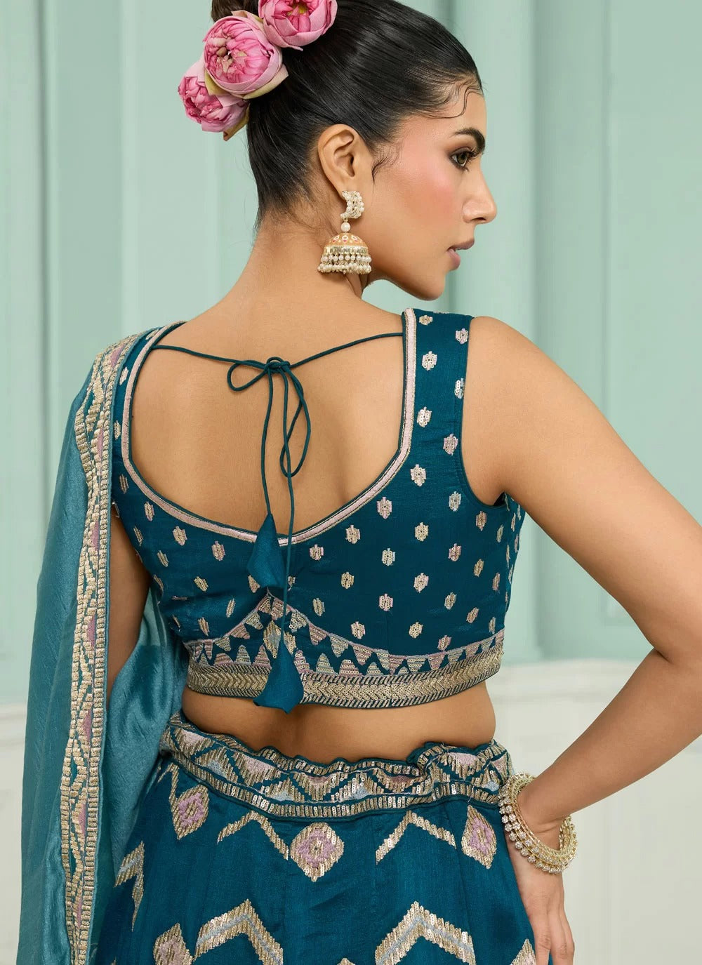 Teal silk lehenga with sweetheart blouse and dupatta