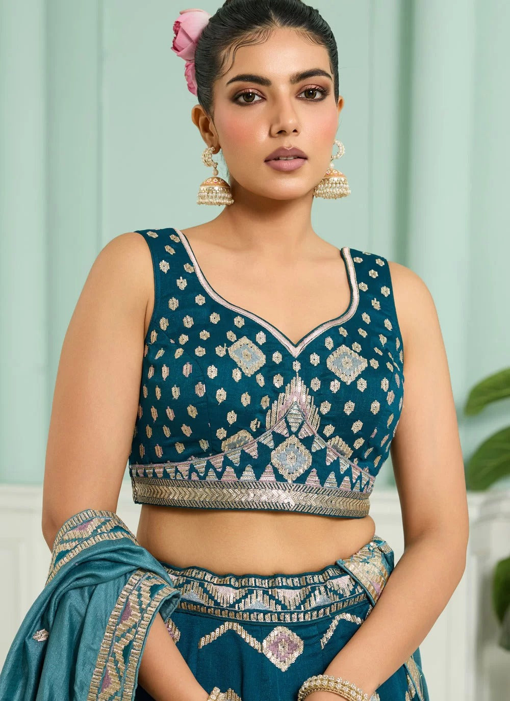 Teal embroidered wedding lehenga with sequins and beads