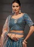 Teal Silk Zarkan And Sequins Party Wear Lehenga Choli