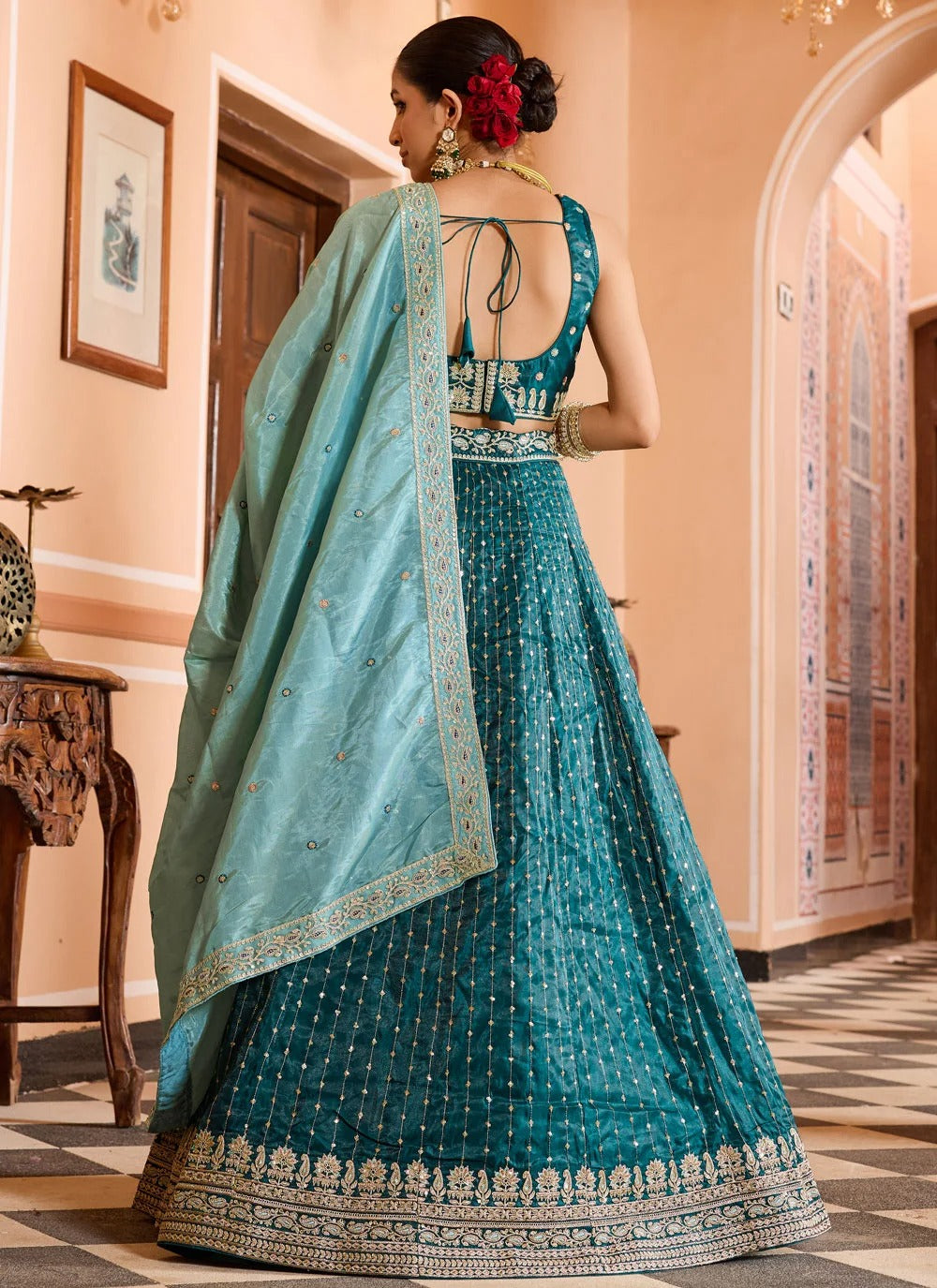 Luxury teal bridesmaid lehenga with pink dupatta