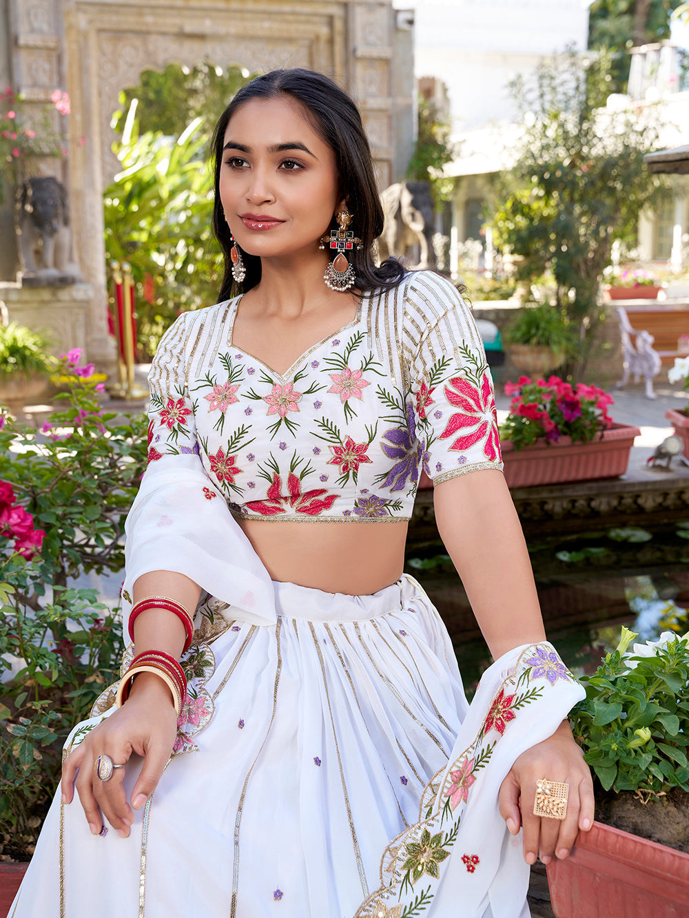 White Color Sequins And Thread Embroidery Work Georgette Lehenga Choli