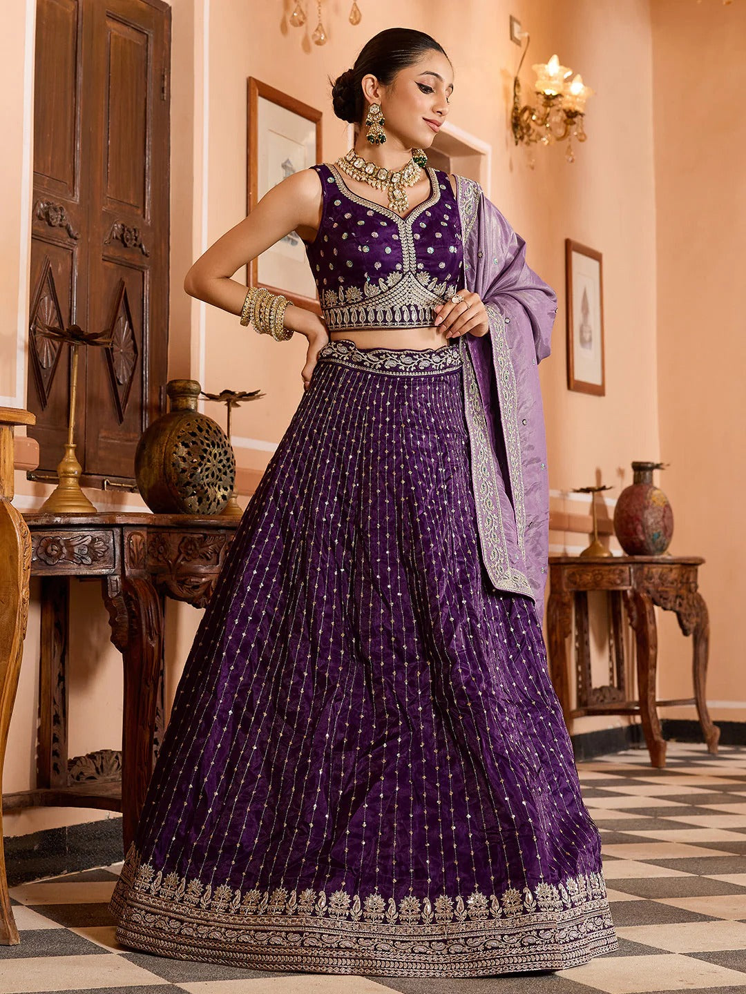 Sequins embroidered purple wedding function lehenga