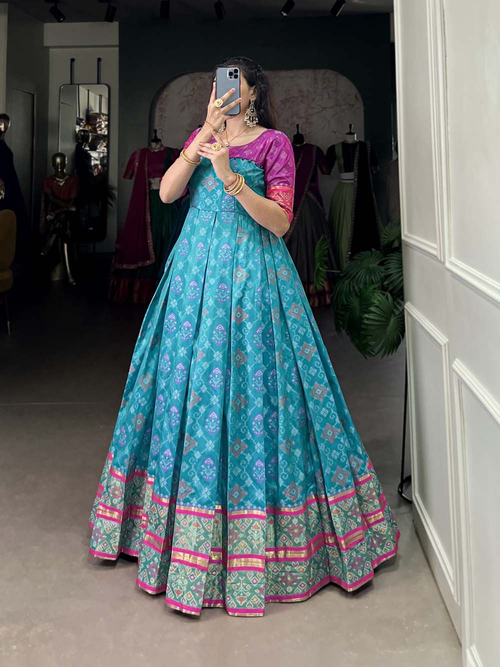 Sky Blue Color Jacquard Silk Patola Print With Zari Weaving Work Gown
