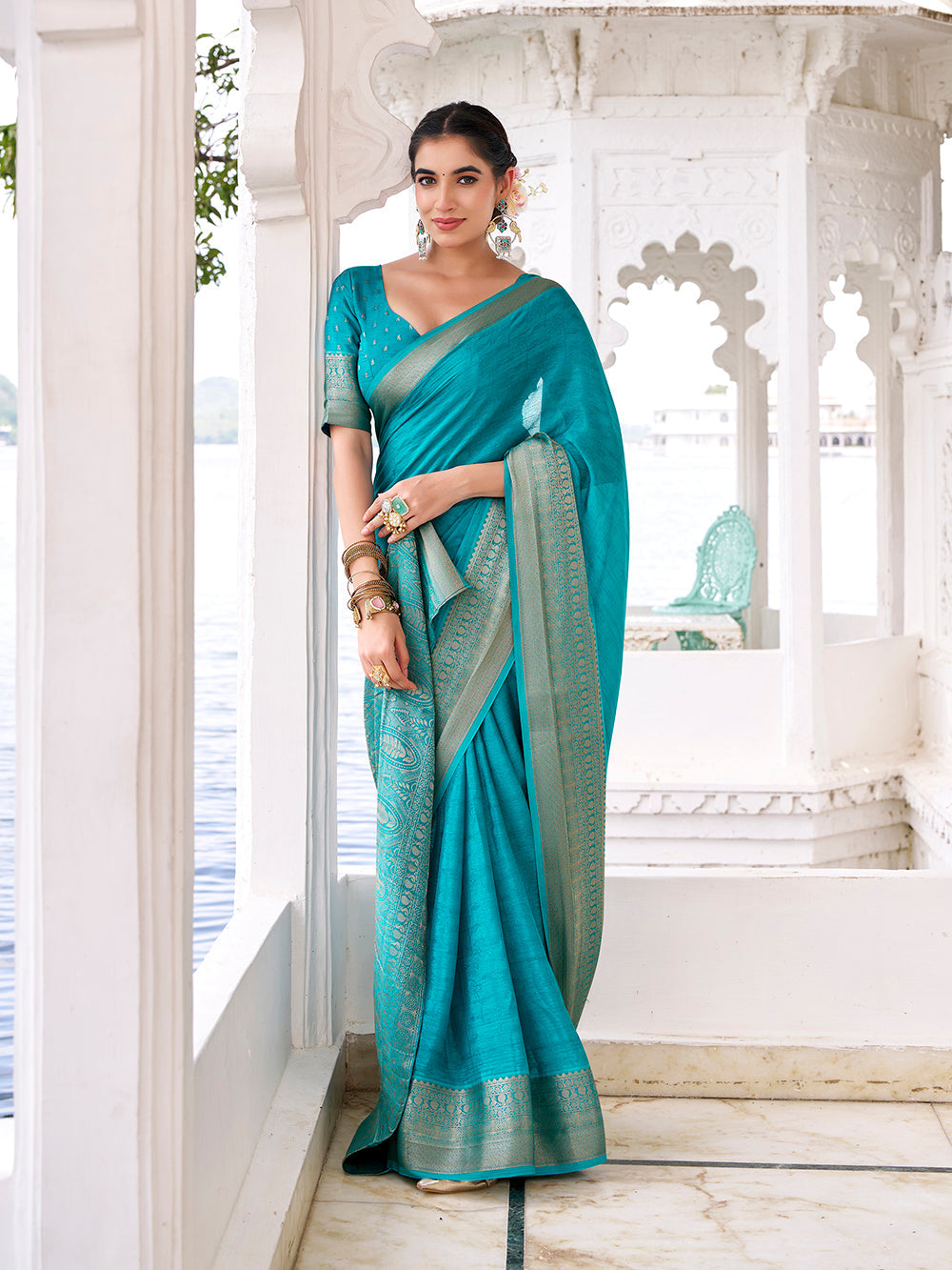 Firozi saree with contrast woven border