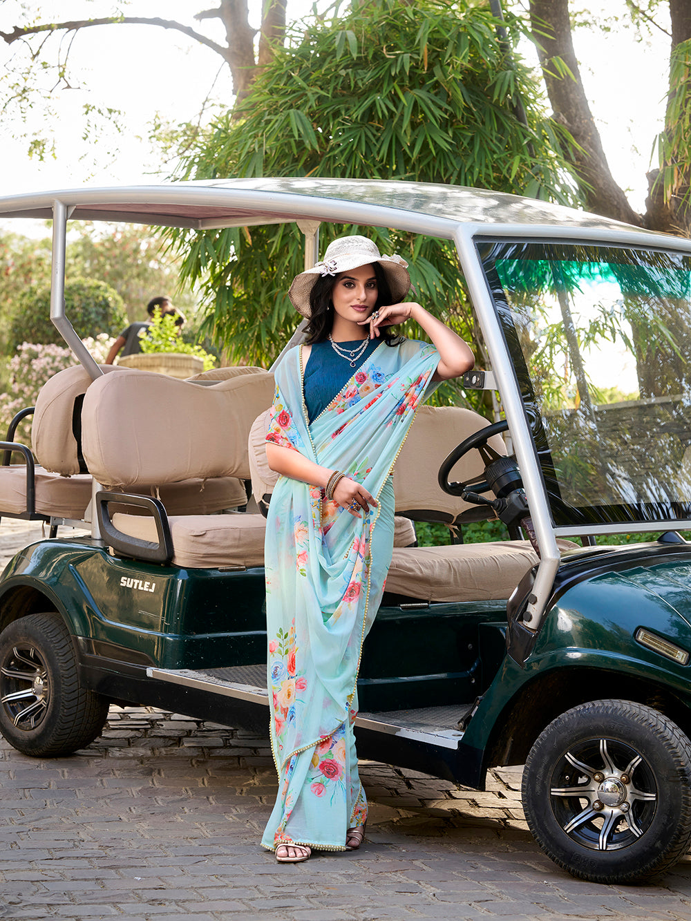 Weightless sky blue saree with pearl lace border