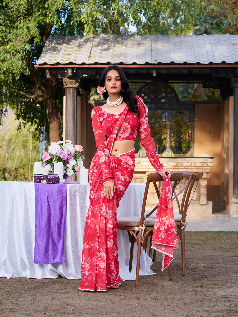 Red saree with elegant pearl lace detailing