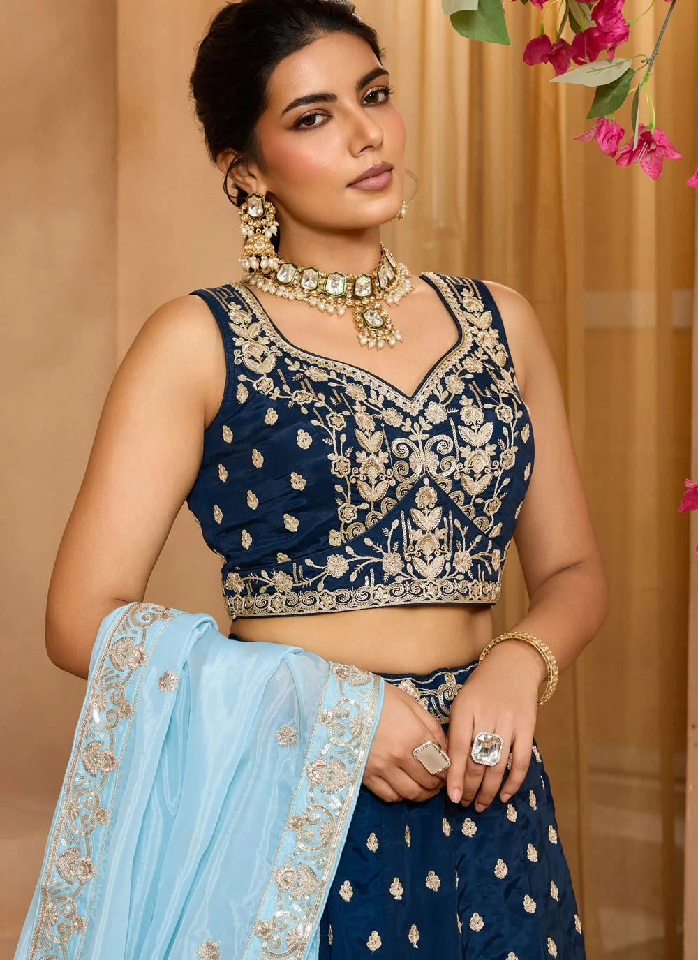 Thread cutwork border detail on navy blue wedding lehenga