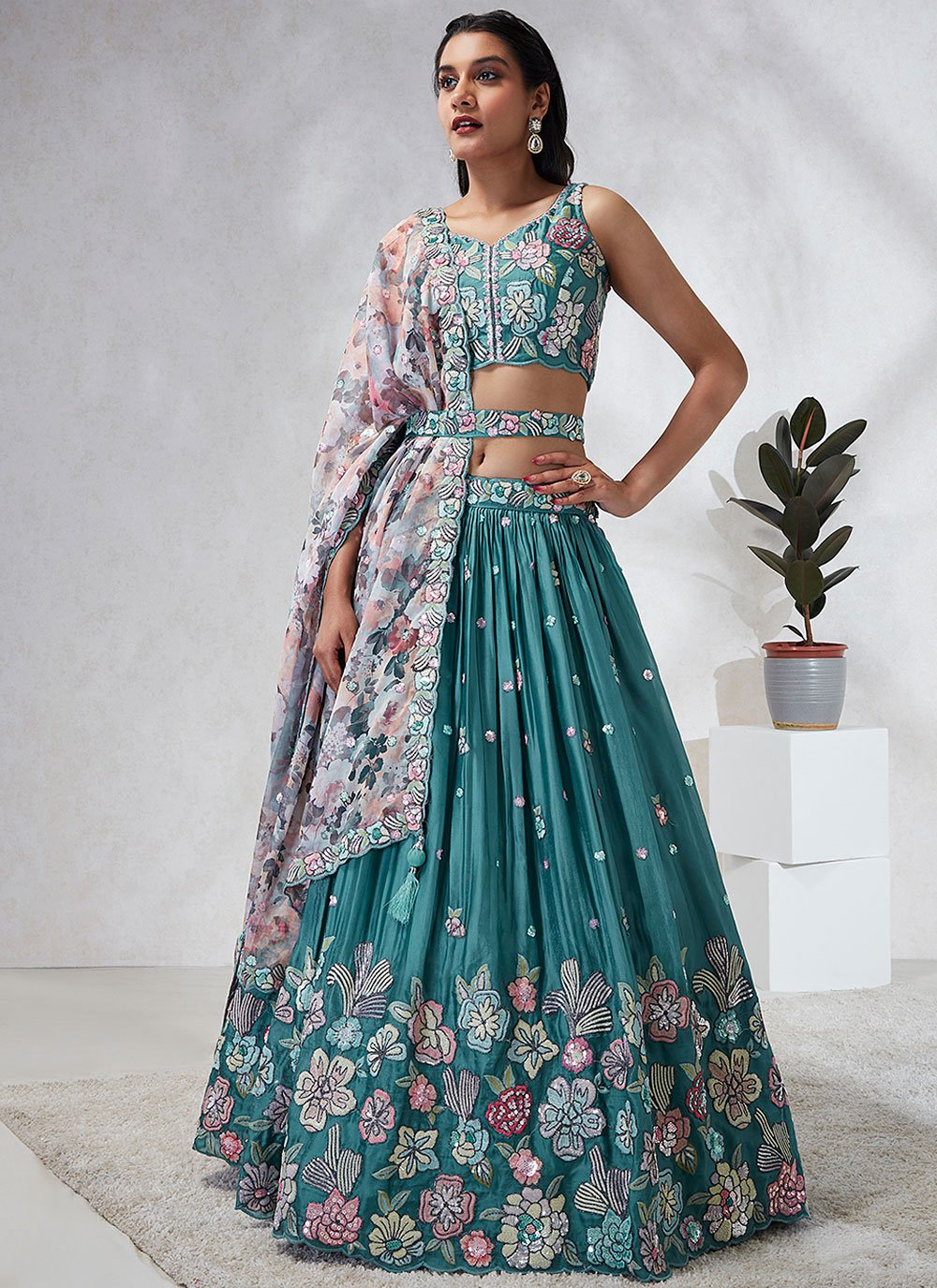 Turquoise Blue Poly Georgette Lehenga Choli Set with Sequins and Thread Embroidery