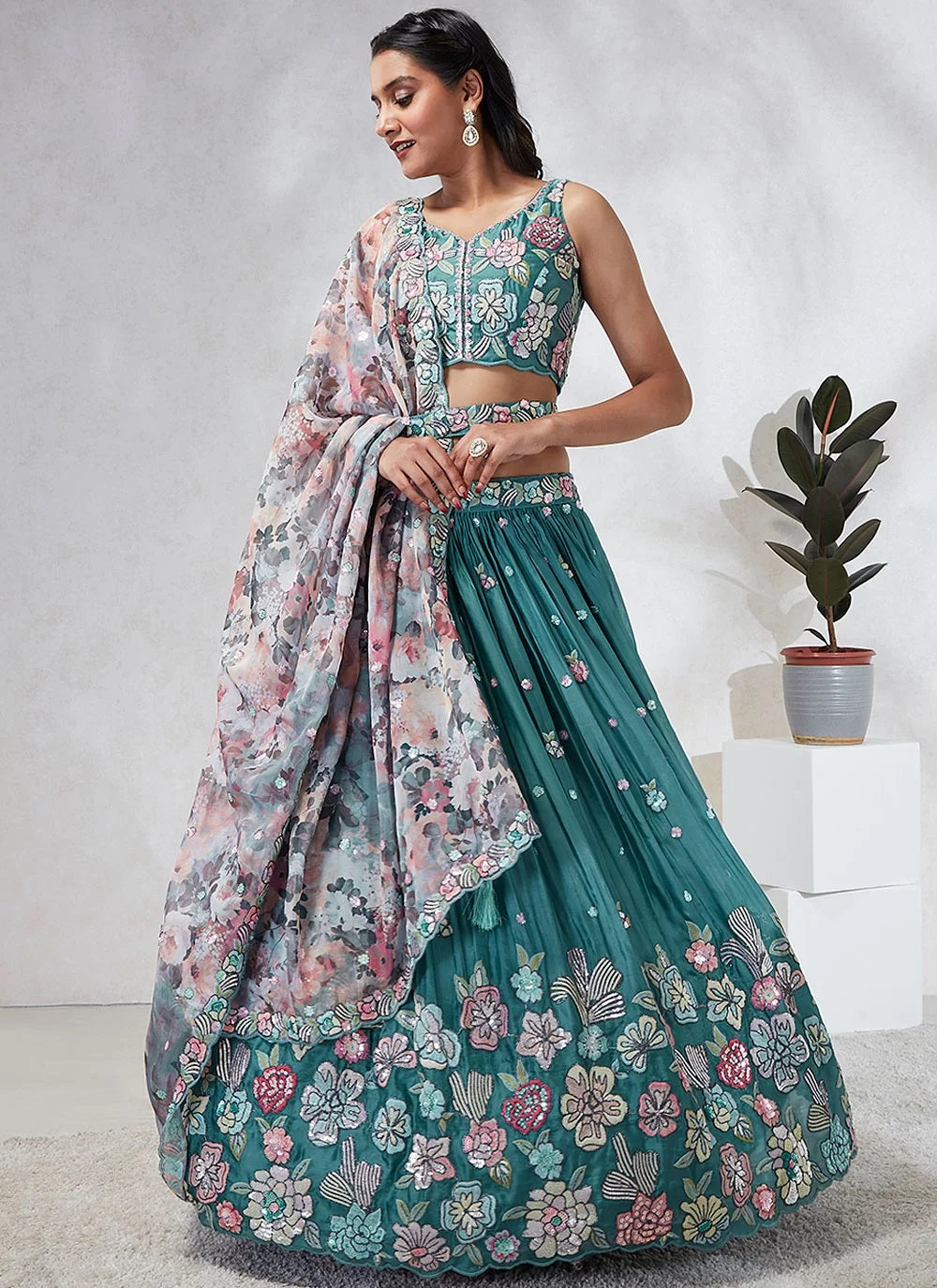 Turquoise Blue Poly Georgette Lehenga Choli Set with Sequins and Thread Embroidery