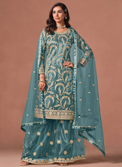 Turquoise palazzo salwar suit featuring embroidery, sequins and zari work